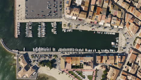 Aerial-vertical-view-of-the-port-of-Mèze,-recreational-boating-and-sailing-Thau